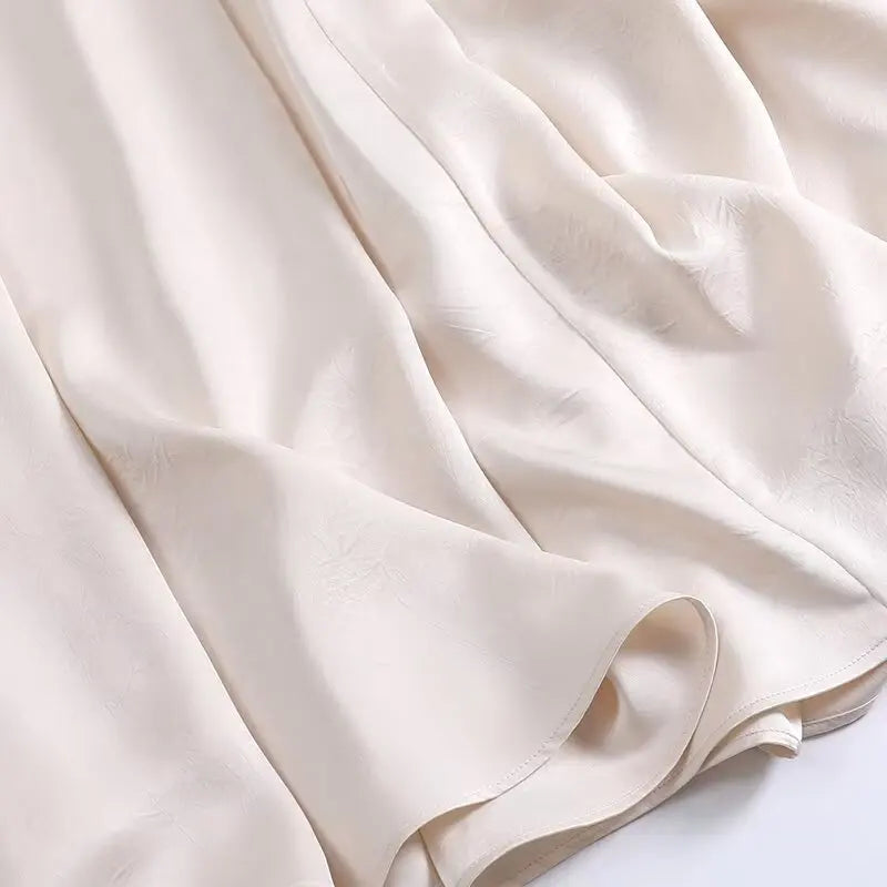 UNIZERA women's skirt is fashionable casual slimming solid color pleated temperament and a new spring style skirt