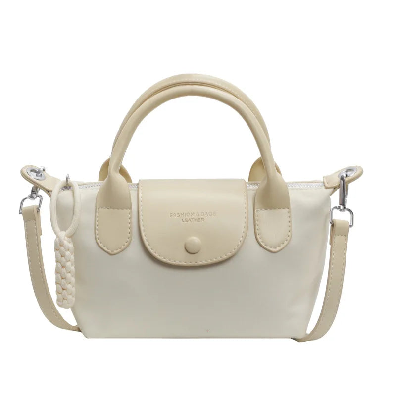 2025 new dragon fruit colored dumpling bag, Oxford cloth dragon splicing handbag, niche cross-border single shoulder crossbody