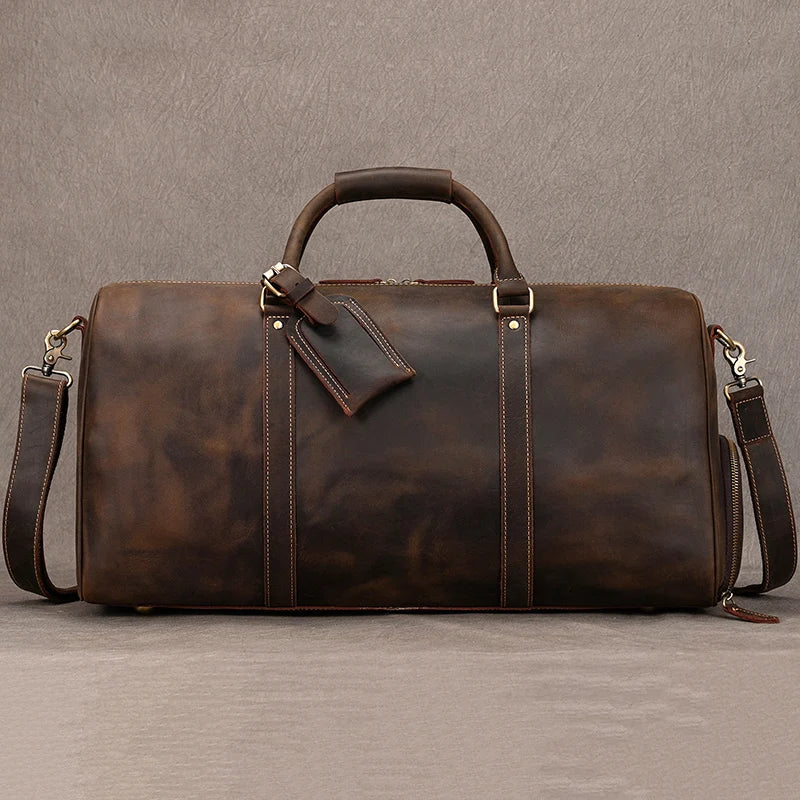 Sac de voyage en cuir véritable de grande capacité pour hommes et femmes, en cuir de vache noir souple, polochon de voyage décontracté, grand sac à bandoulière pour week-end