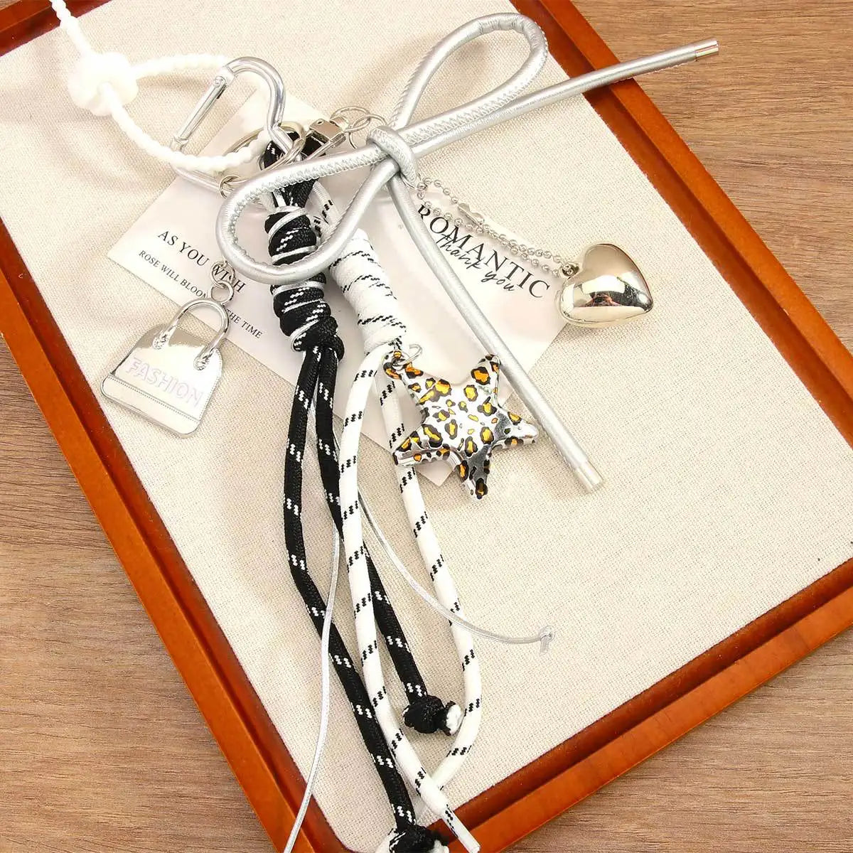 New Leopard Print Five-pointed Star Pendant Mini Bag Love Bow Braided Rope Bag Pendant Keychain High Sense Bag Accessories