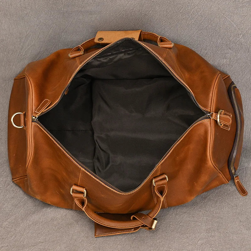 Sac de voyage en cuir véritable de grande capacité pour hommes et femmes, en cuir de vache noir souple, polochon de voyage décontracté, grand sac à bandoulière pour week-end