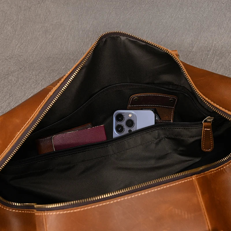 Sac de voyage en cuir véritable de grande capacité pour hommes et femmes, en cuir de vache noir souple, polochon de voyage décontracté, grand sac à bandoulière pour week-end