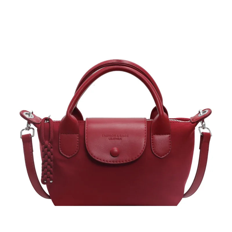 2025 new dragon fruit colored dumpling bag, Oxford cloth dragon splicing handbag, niche cross-border single shoulder crossbody