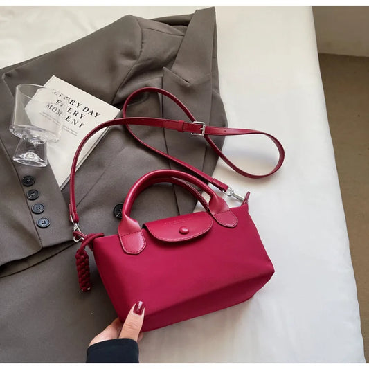 2025 new dragon fruit colored dumpling bag, Oxford cloth dragon splicing handbag, niche cross-border single shoulder crossbody