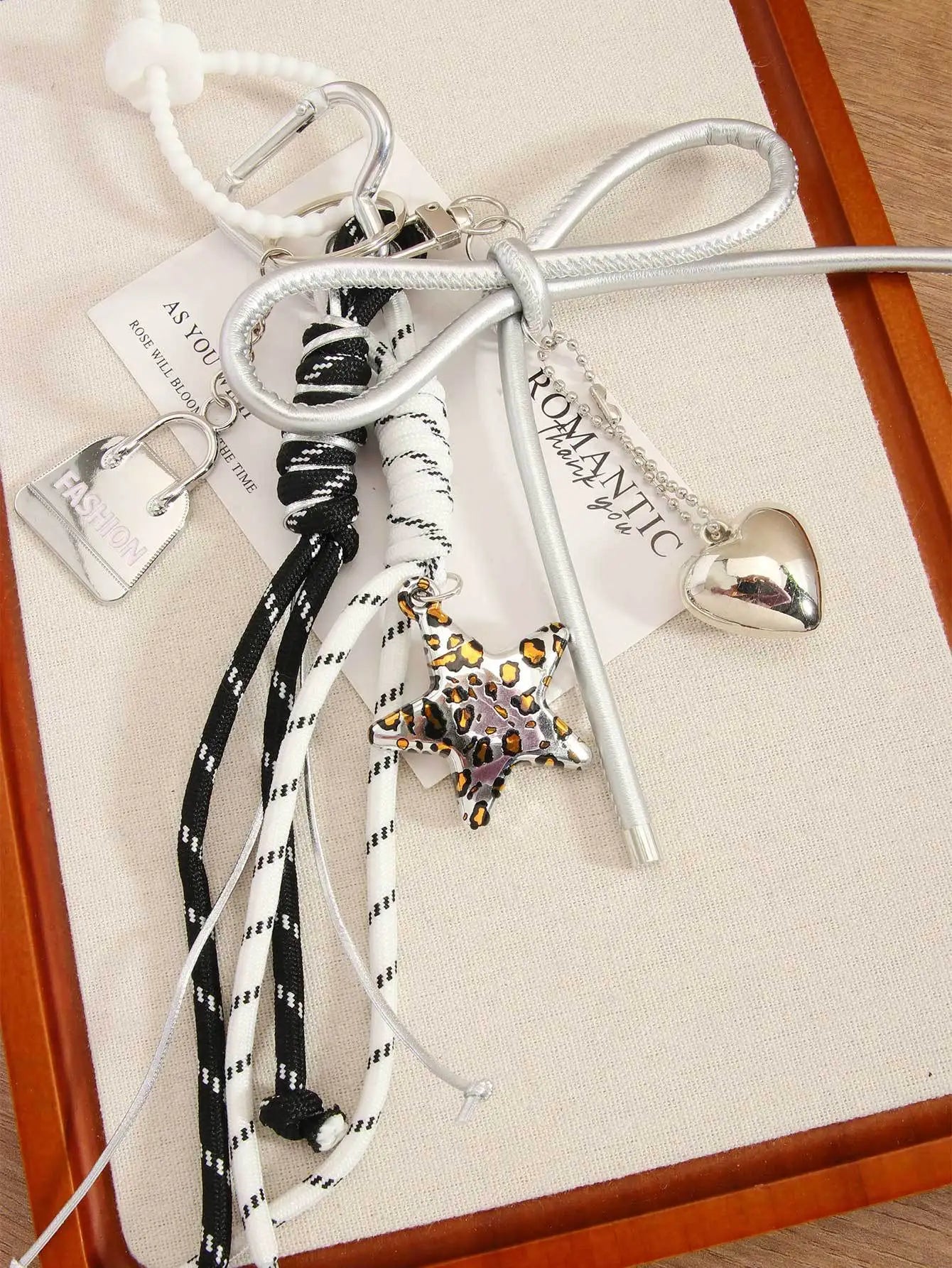 New Leopard Print Five-pointed Star Pendant Mini Bag Love Bow Braided Rope Bag Pendant Keychain High Sense Bag Accessories
