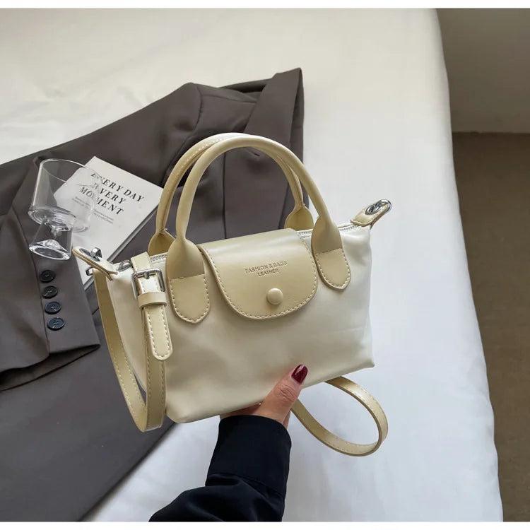 2025 new dragon fruit colored dumpling bag, Oxford cloth dragon splicing handbag, niche cross-border single shoulder crossbody